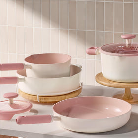 CAROTE saucepans shown after cooking with quick, easy cleaning.