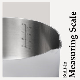 CAROTE wooden-handle saucepan offers secure grip and comfortable lifting.