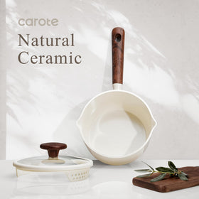 CAROTE set on kitchen counter shows modern white finish for stylish cooking.