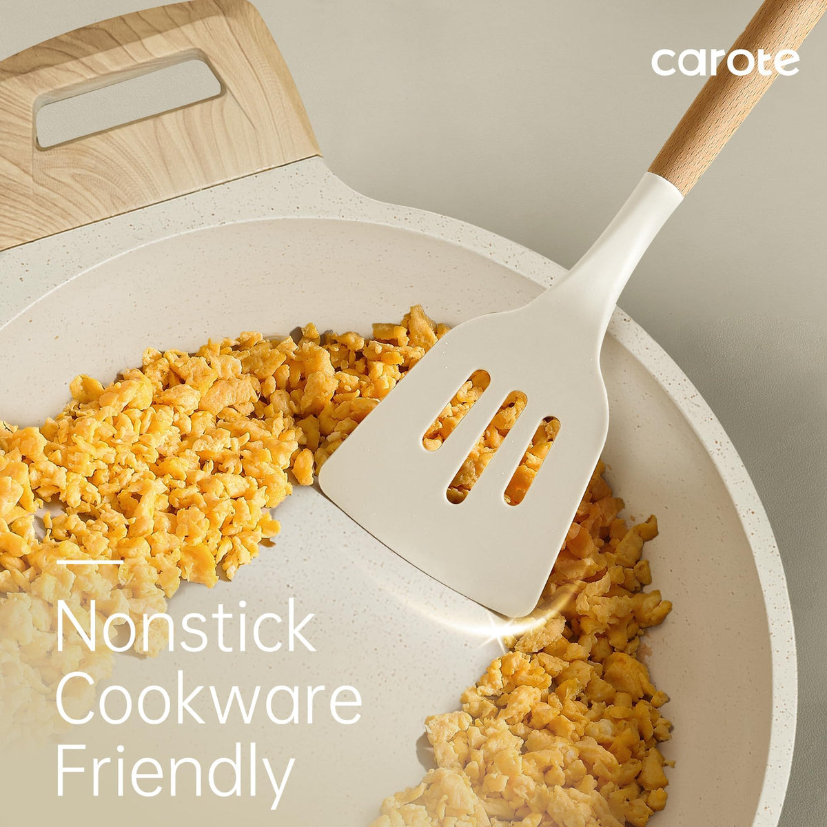 CAROTE slotted silicone spatula to drain liquids while cooking.