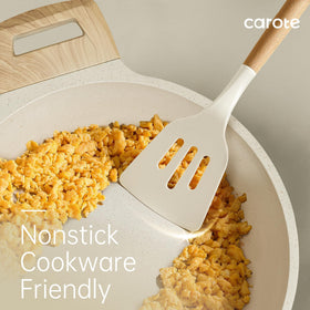 CAROTE slotted silicone spatula to drain liquids while cooking.