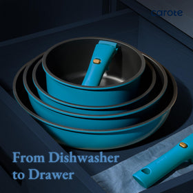 CAROTE stackable storage of pots and pans for compact organization.