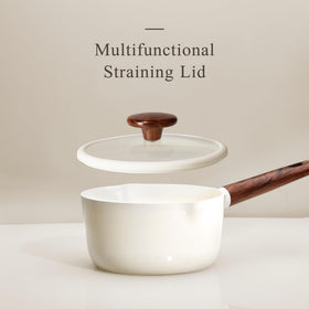 CAROTE wooden-handle spatula extends coating life during cooking.