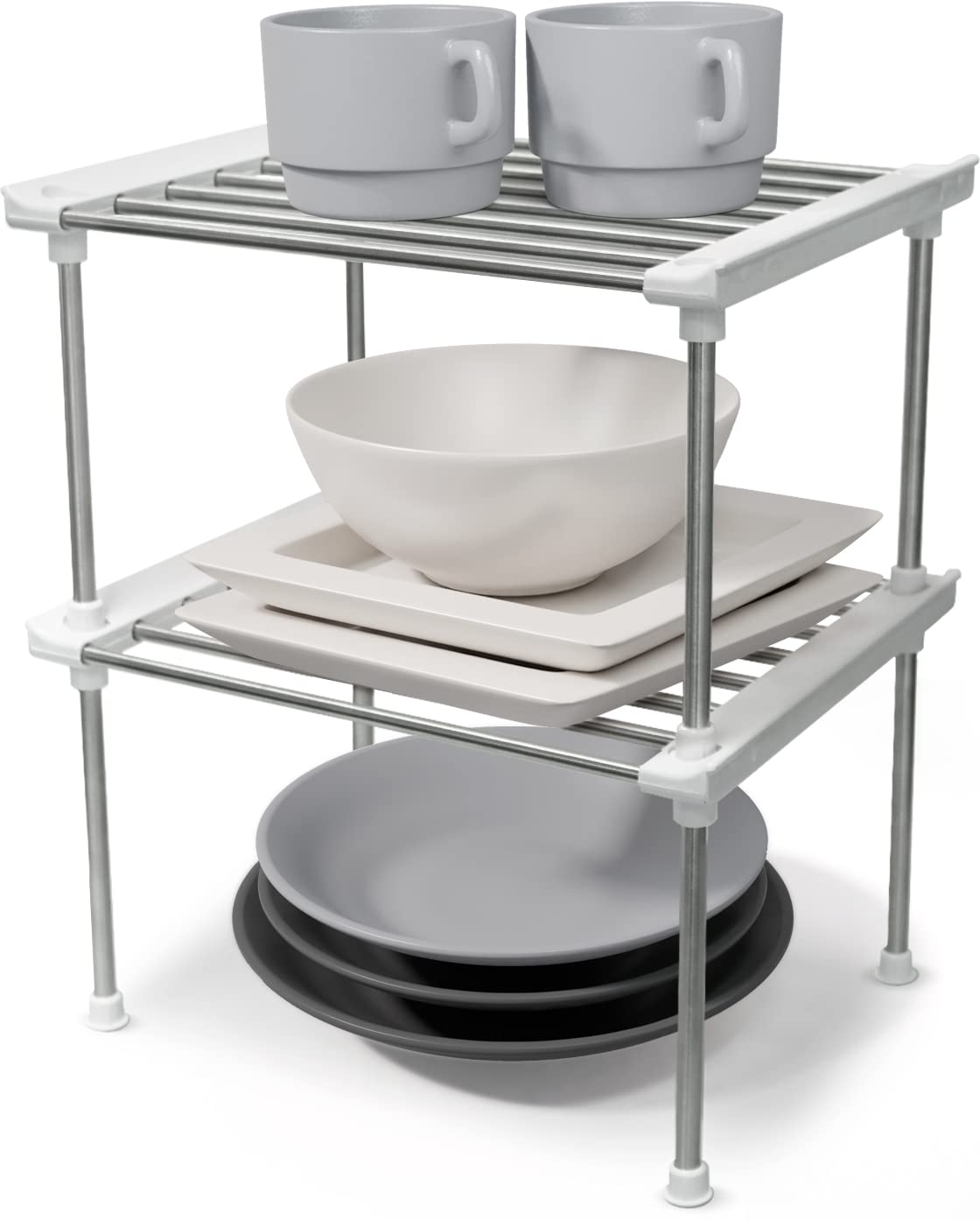 Carrotez cabinet organizer stackable set on counter maximizing plate and cup storage.