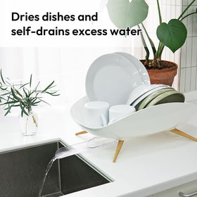 Carrotez dish drying rack swivel spout in action directs water into sink