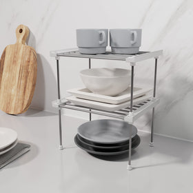 Carrotez metal shelf organizer in pantry, improving vertical storage.