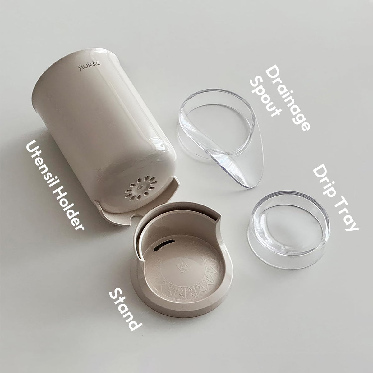 Carrotez Utensil Drying Holder beige color blends with any counter.