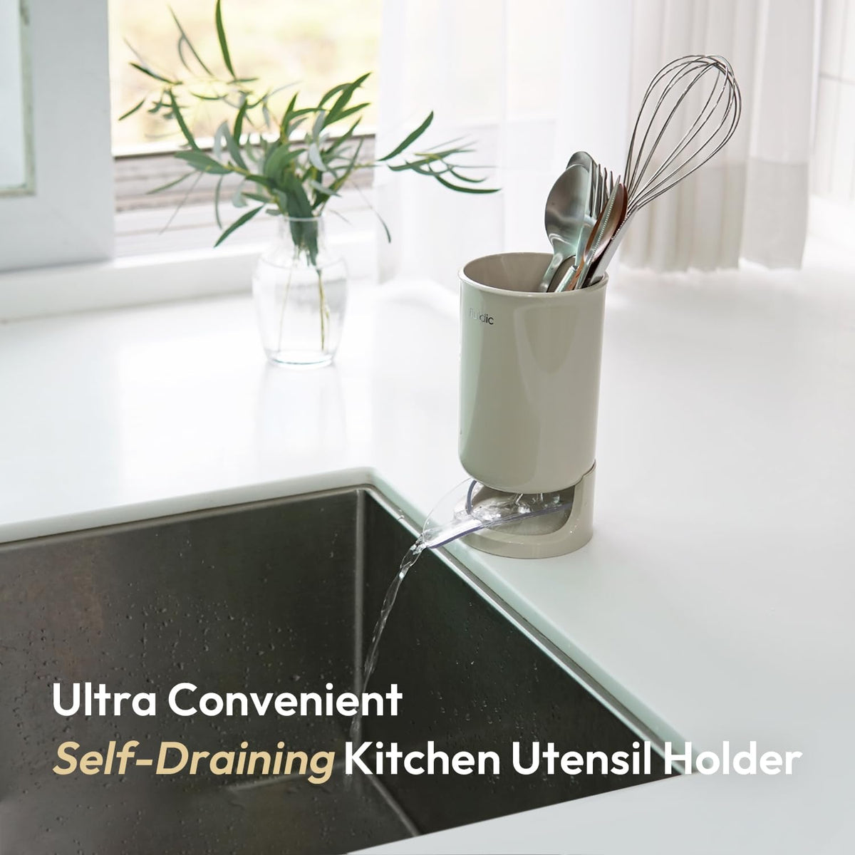 Carrotez Utensil Drying Holder with drainage spout promotes quick utensil drying.