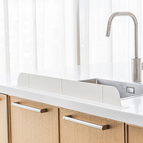 Casa Starlet ultra-wide 30in splash guard protects clothes with broad sink coverage.
