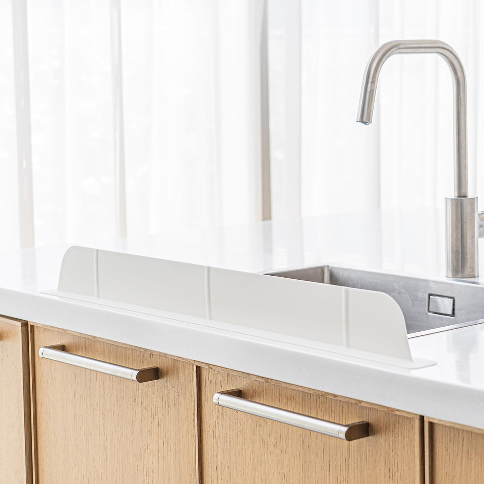 Casa Starlet ultra-wide 30in splash guard protects clothes with broad sink coverage.