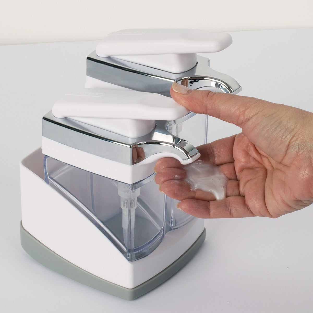 Casabella Sink Sider Duo offers one-hand operation for convenient soap dispensing.