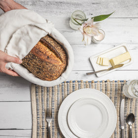 CASADEMA serving basket on dining table adds natural warmth to meals