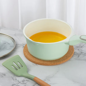 Cazzon cork trivets styled as wall decor and plant coasters for versatile setup.