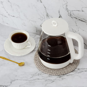 Cazzon kitchen mats shield tables when serving hot dishes and reduce noise.