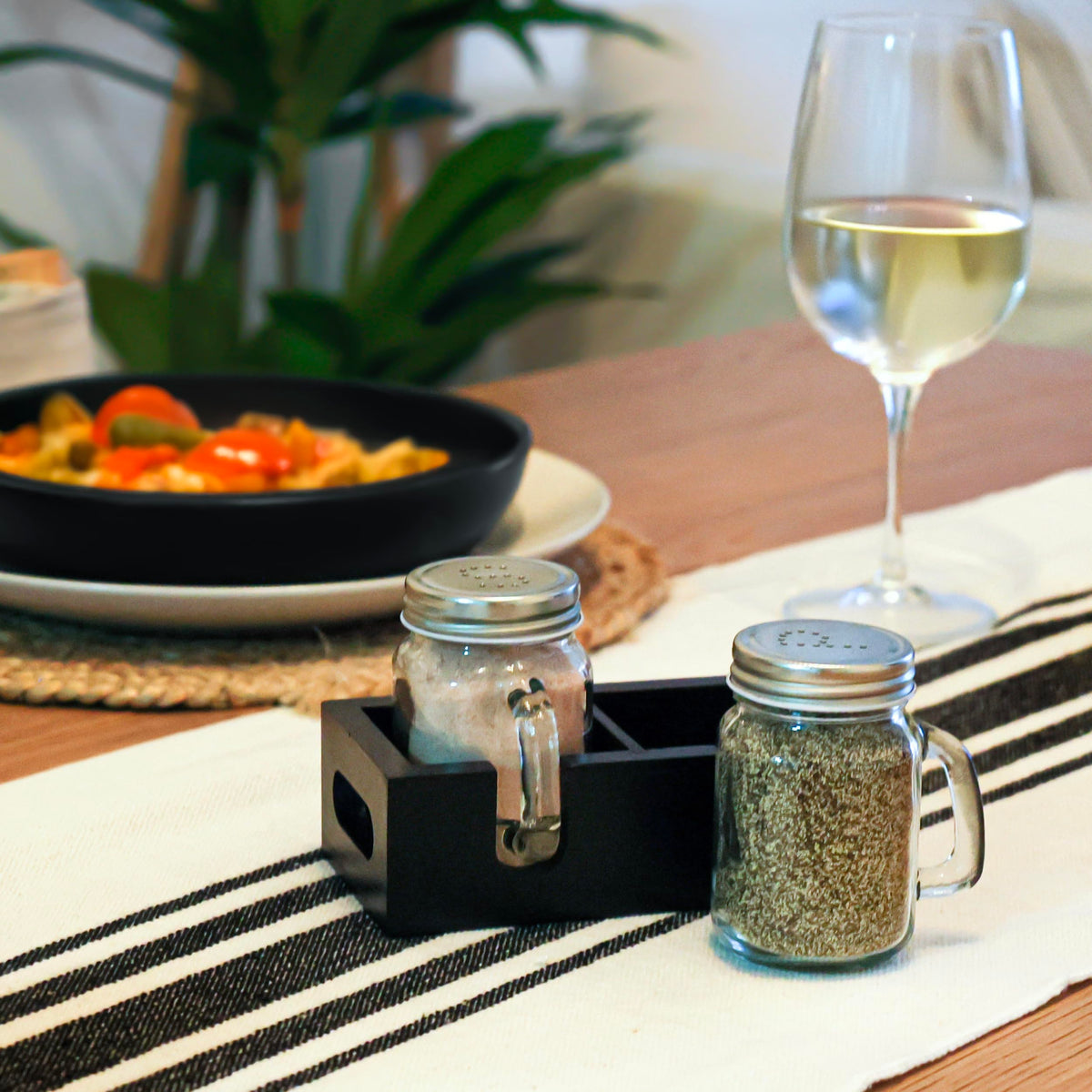 CB Accessories Mason jar salt and pepper shakers in a black farmhouse-style set on a counter.