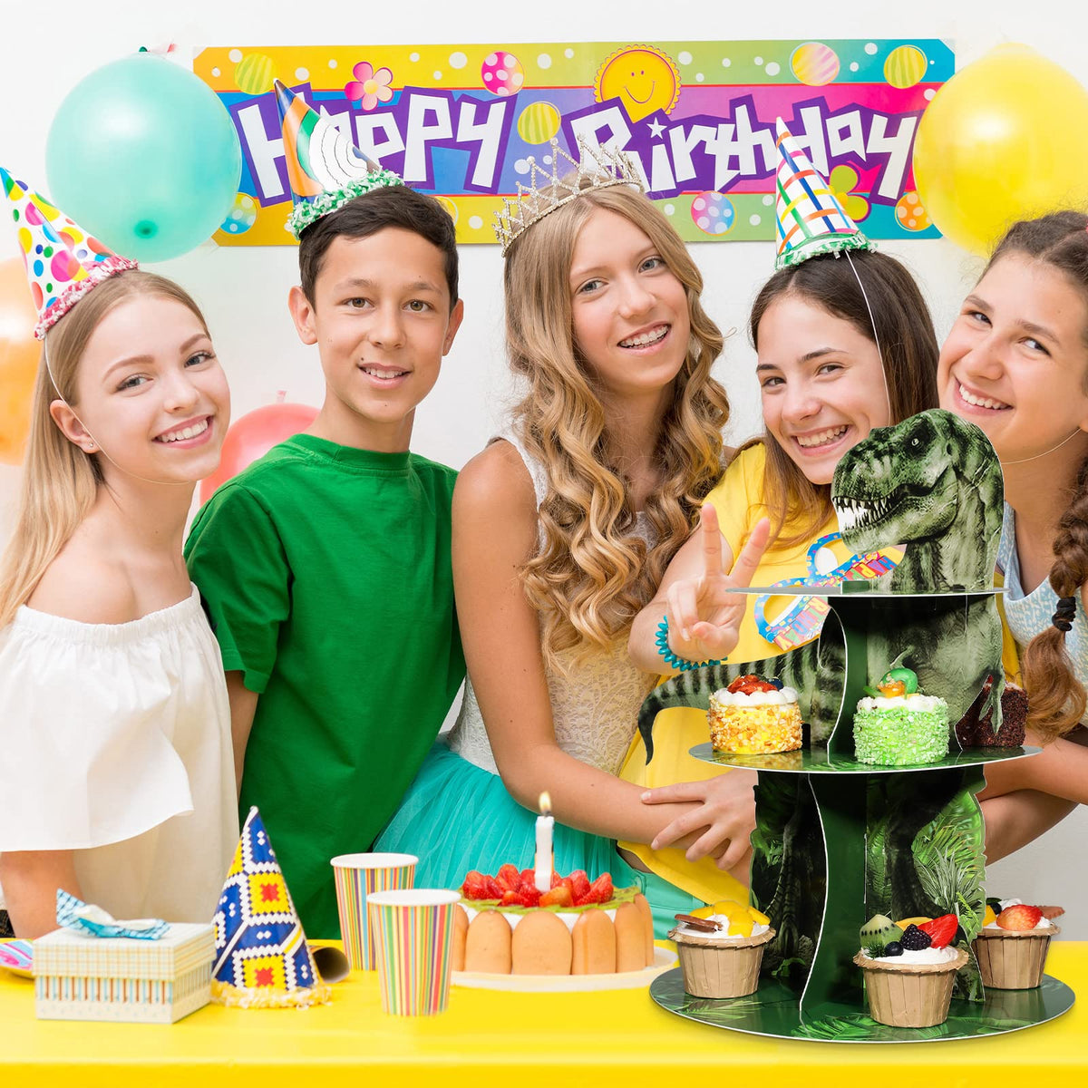 Censen dinosaur birthday party display on dessert table attracts guests