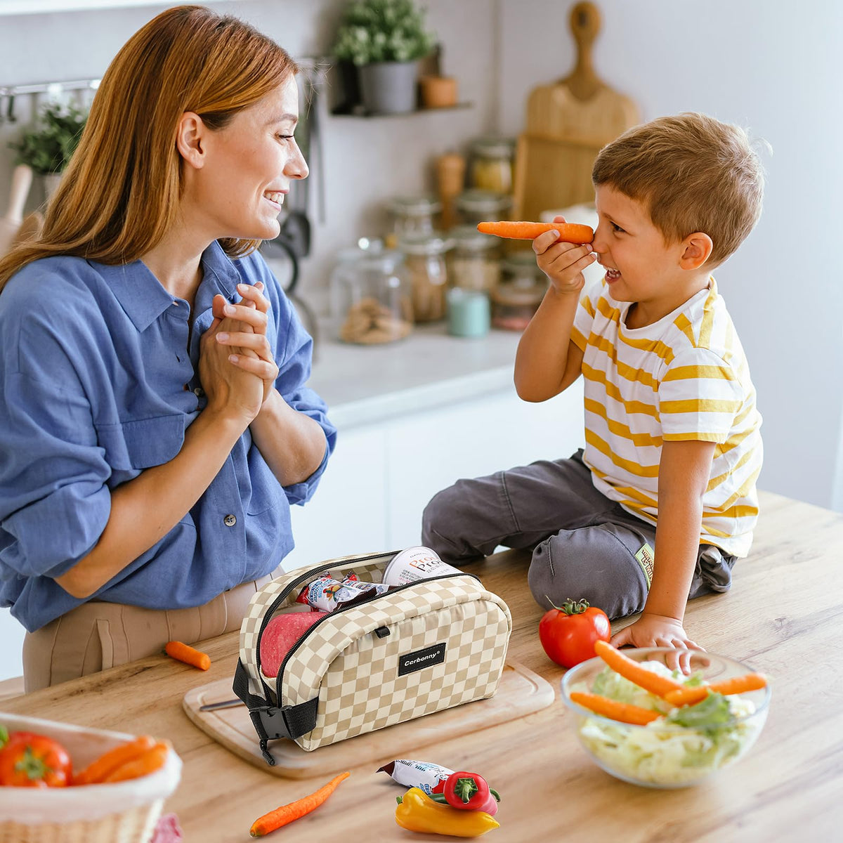 Cerbonny bag's back pocket and buckle enable easy access and attachment.