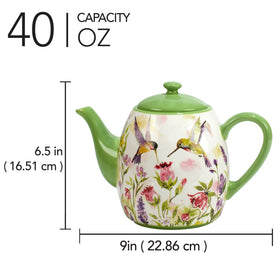 Table setting featuring the teapot with matching dinnerware for a nature-inspired mood.