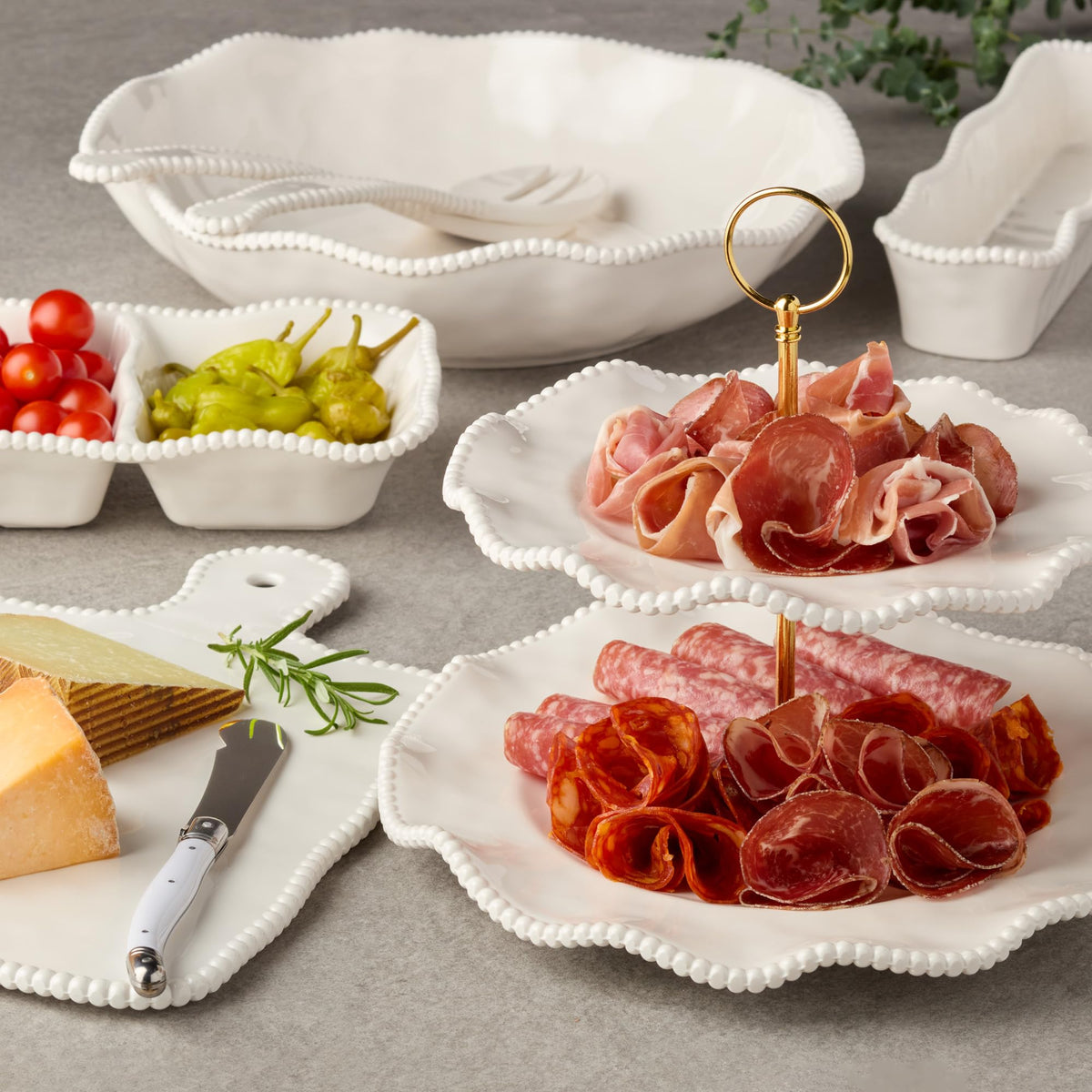 Perlette cream melamine salad plate 9in, showcasing scalloped edges for upscale table settings.