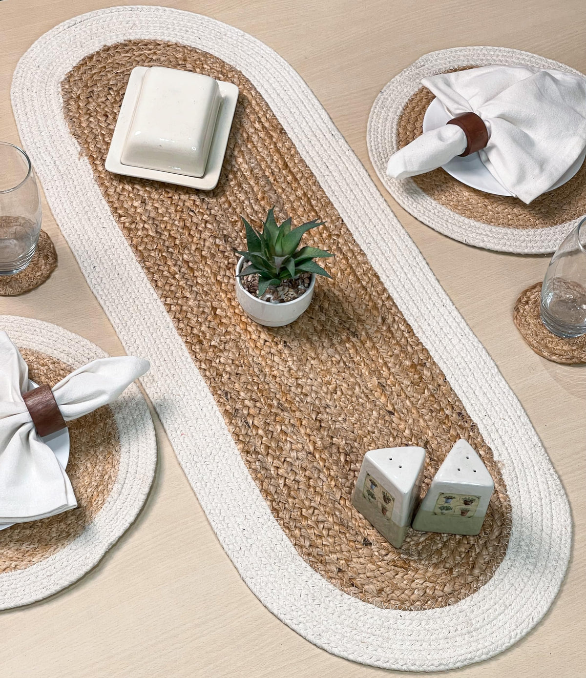 Chardin Home Verona oval runner texture close-up reveals hand-braided craftsmanship.