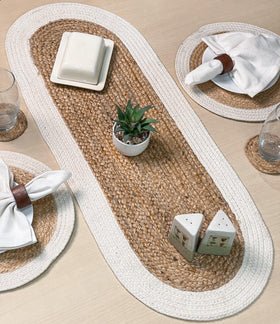 Chardin Home Verona oval runner texture close-up reveals hand-braided craftsmanship.
