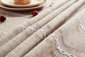 Chassic farmhouse-style tablecloth in light coffee complements rustic decor