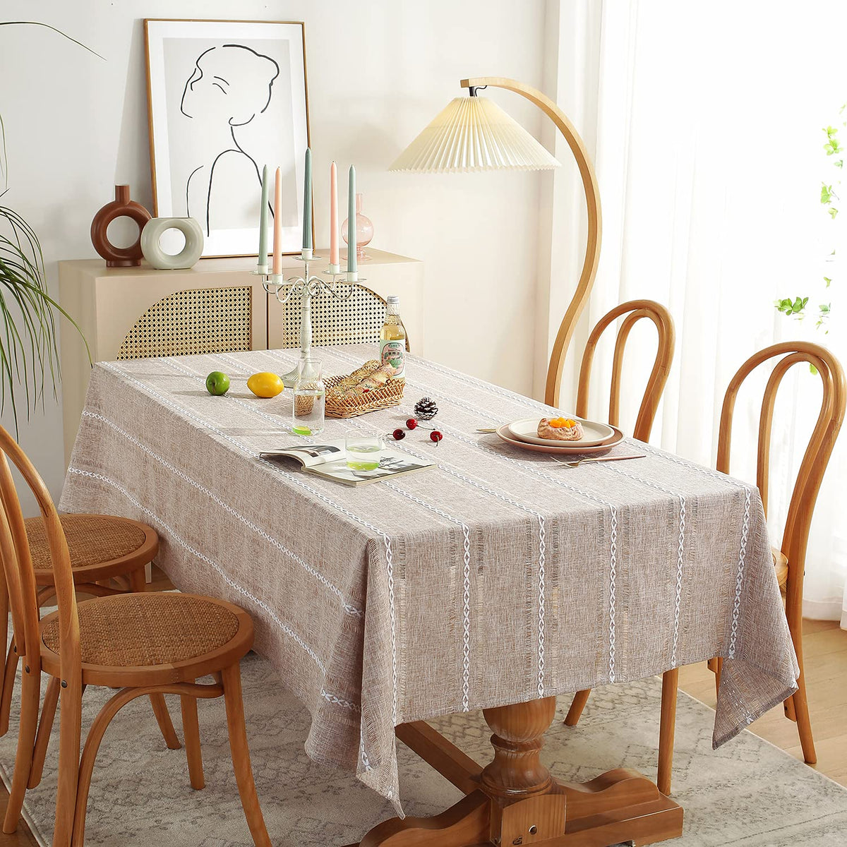 Chassic rectangle 60x84 tablecloth placed on a dining room table