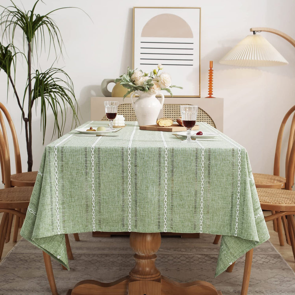 Chassic rectangle tablecloth on a dining table; 60x84, wrinkle-free for easy daily meals.