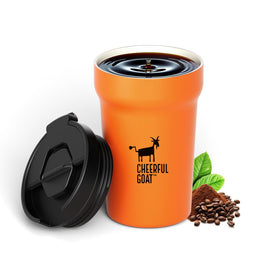 Cheerful Goat insulated mug with ceramic liner shows bright orange exterior for pure flavor