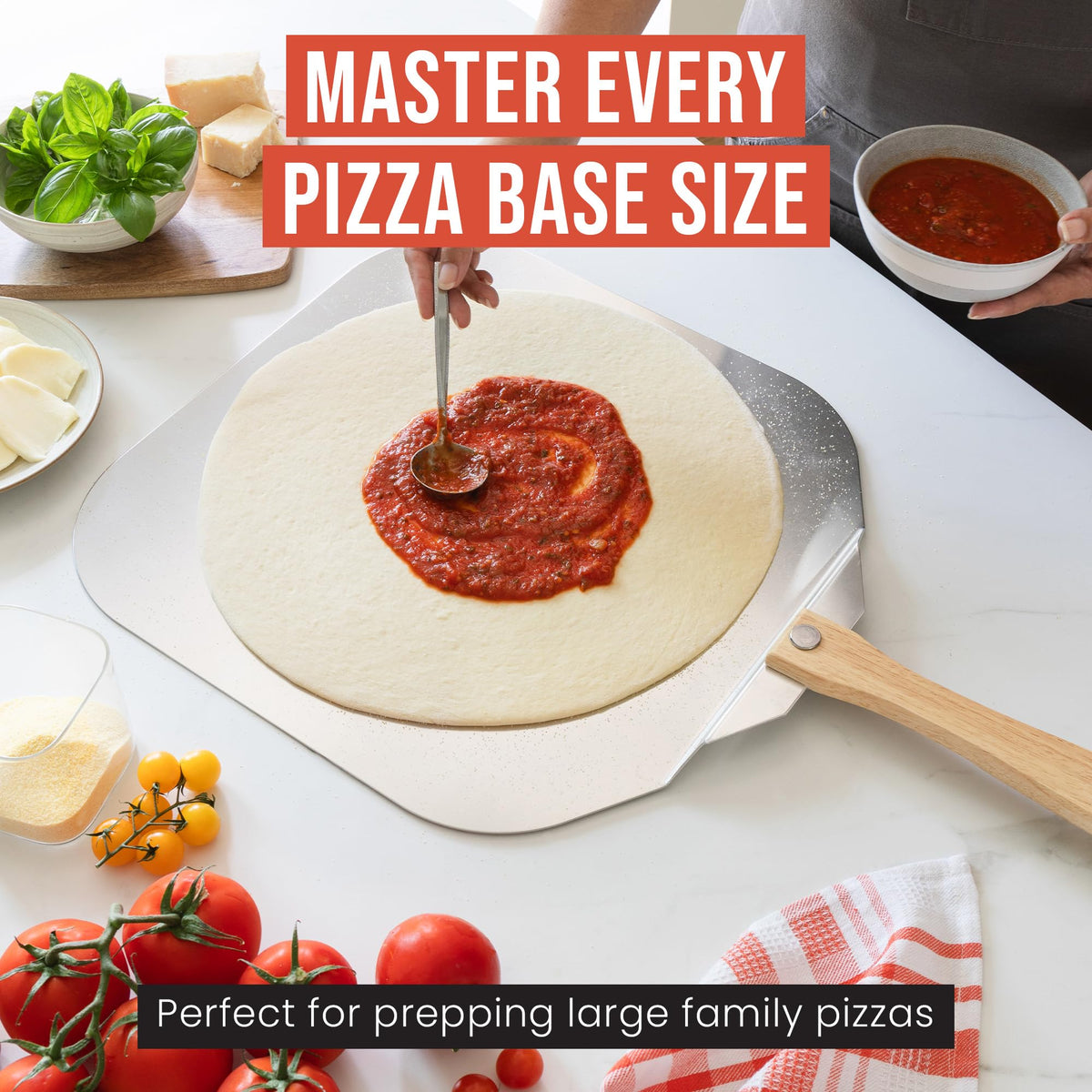 Chef Pomodoro peel in action lifting pizzas from hot oven.
