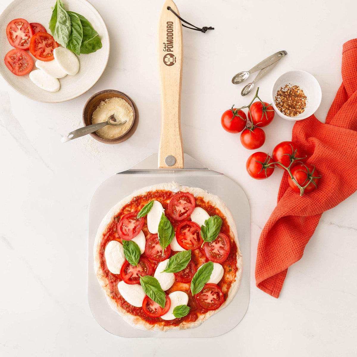 Chef Pomodoro pizza peel in use for homemade bread and focaccia.