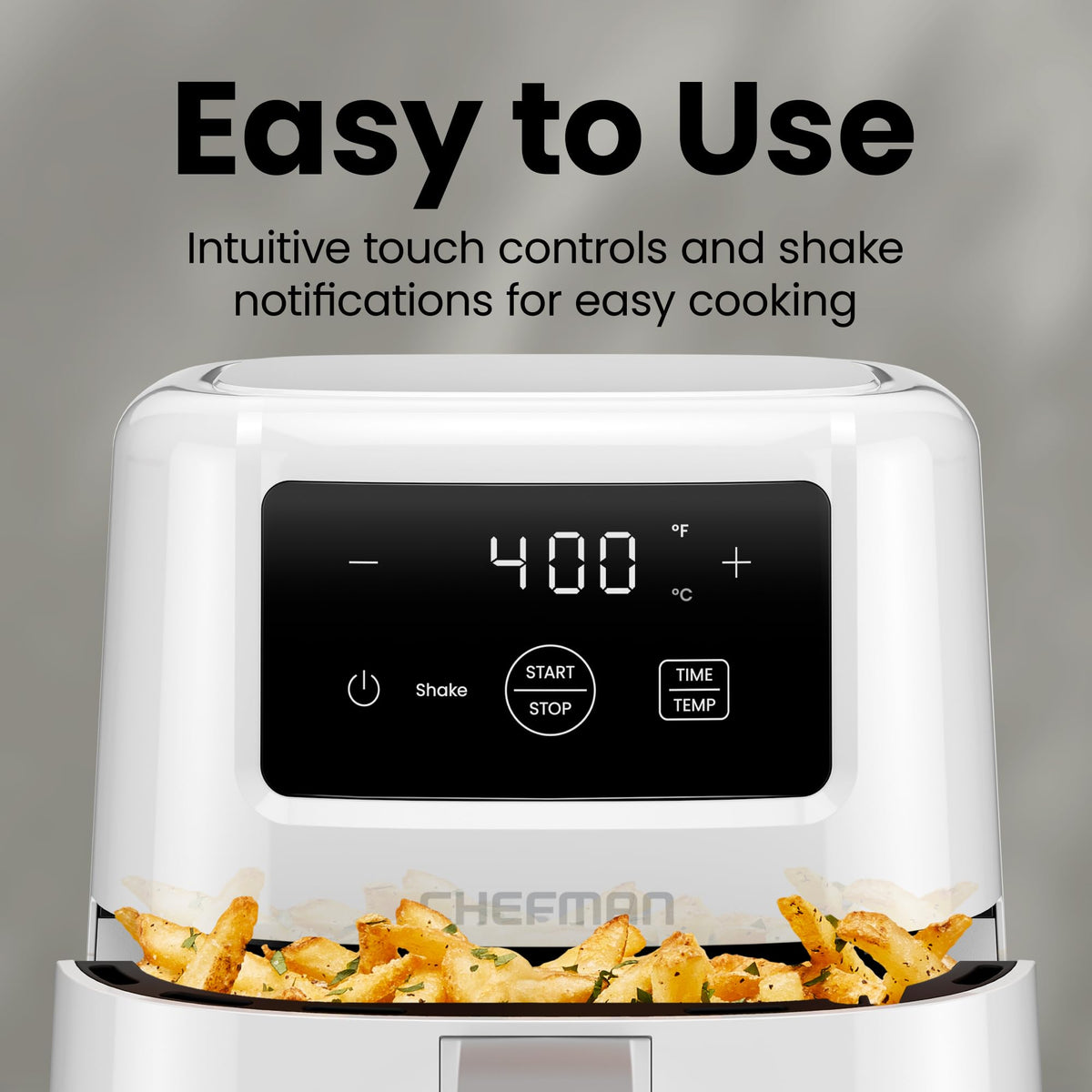 Chefman 2 Qt Mini Air Fryer on a kitchen counter in a small space