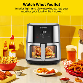 Chefman Easy-View interior light highlights golden-brown chicken or fish