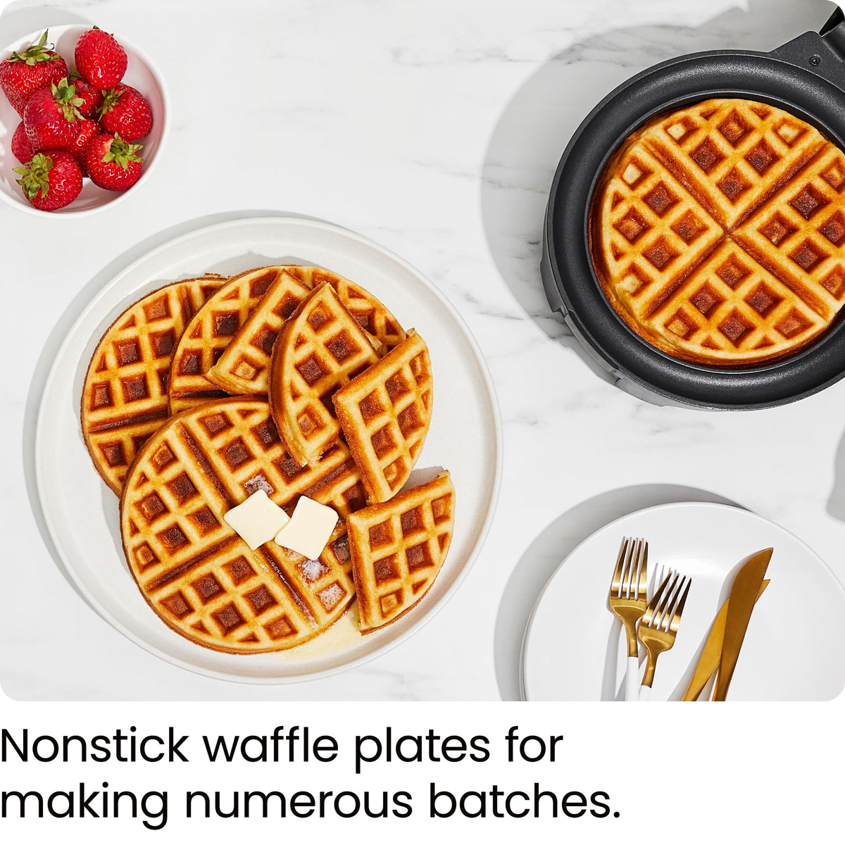 Measuring cup included helps pour batter accurately.