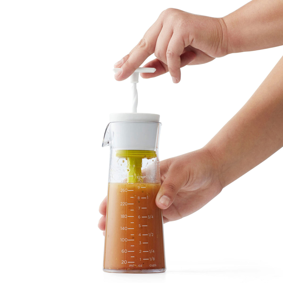 Chef'n Emulstir dripless spout prevents counter drips after pouring.
