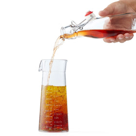 Chef'n Emulstir pump-action whisk blends emulsions quickly.