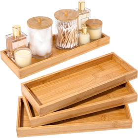 Chengu bamboo vanity trays set of three, stackable for versatile bathroom organization.