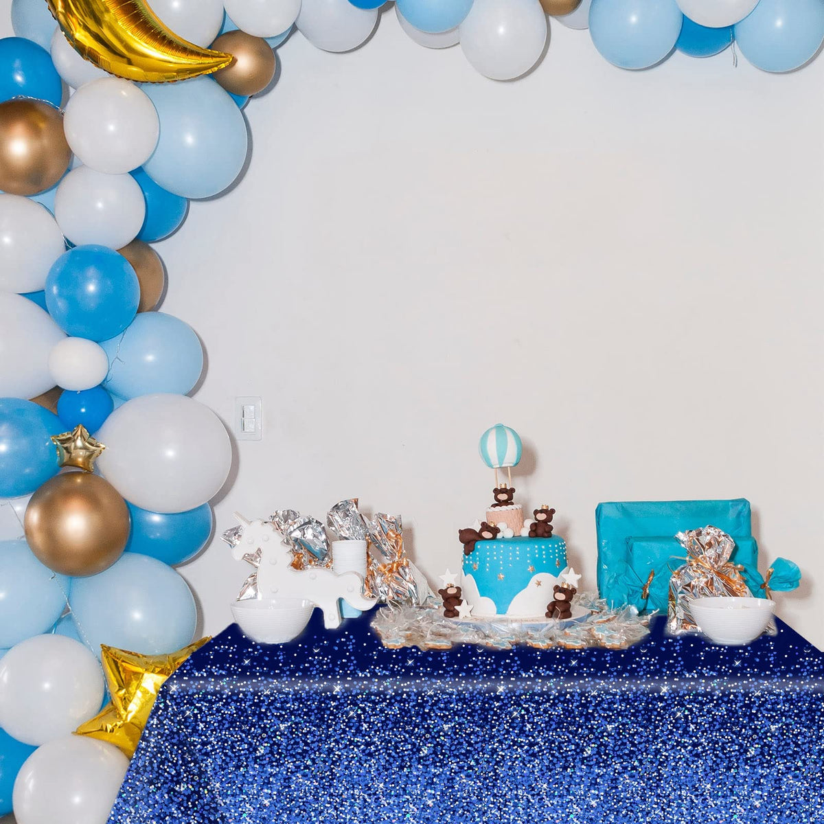 Chiazllta royal blue-silver tablecloth enhances decor and protects surfaces