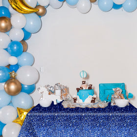 Chiazllta royal blue-silver tablecloth enhances decor and protects surfaces