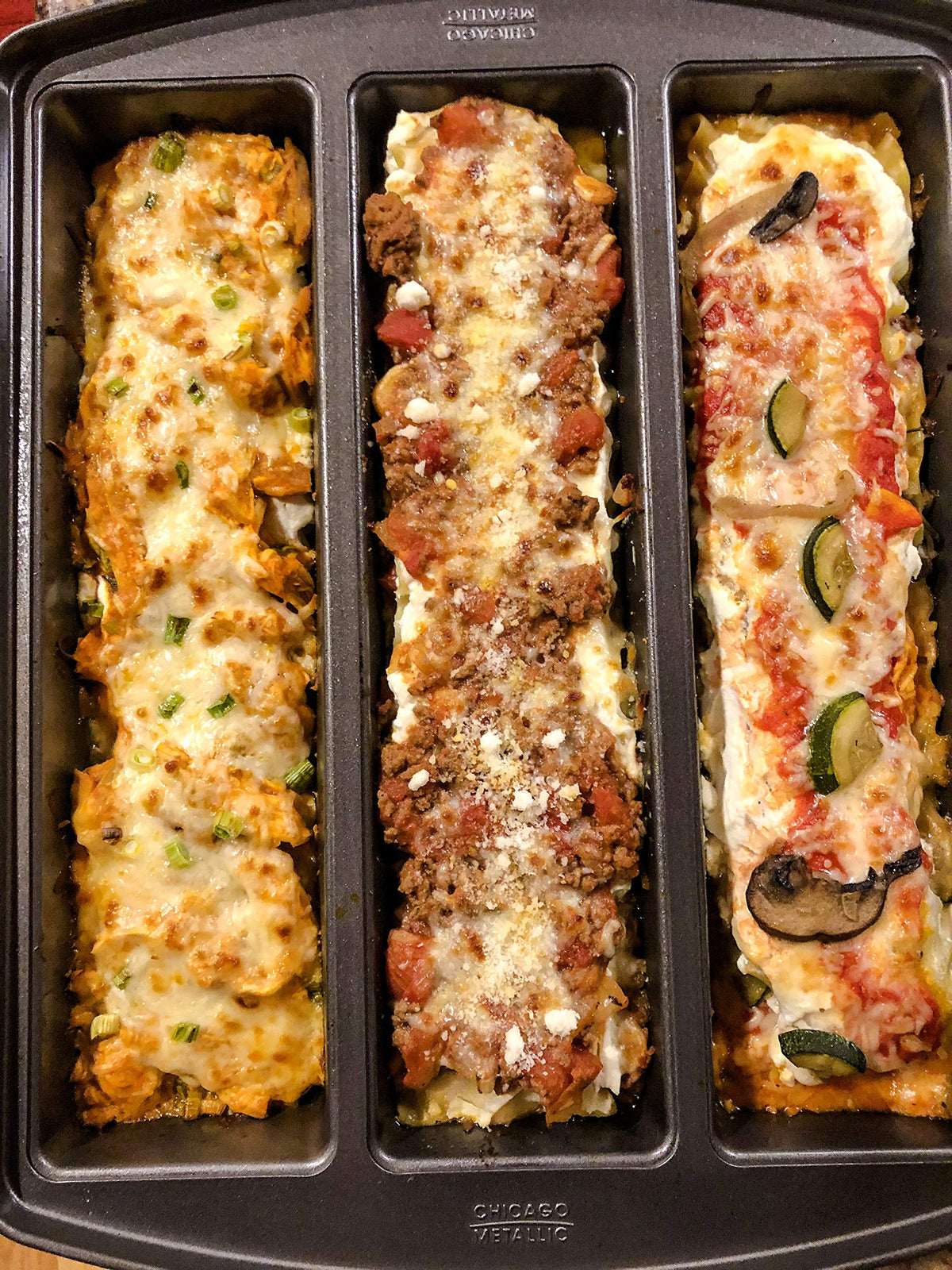 Chicago Metallic Lasagna Trio Pan stacked for compact storage and organization.