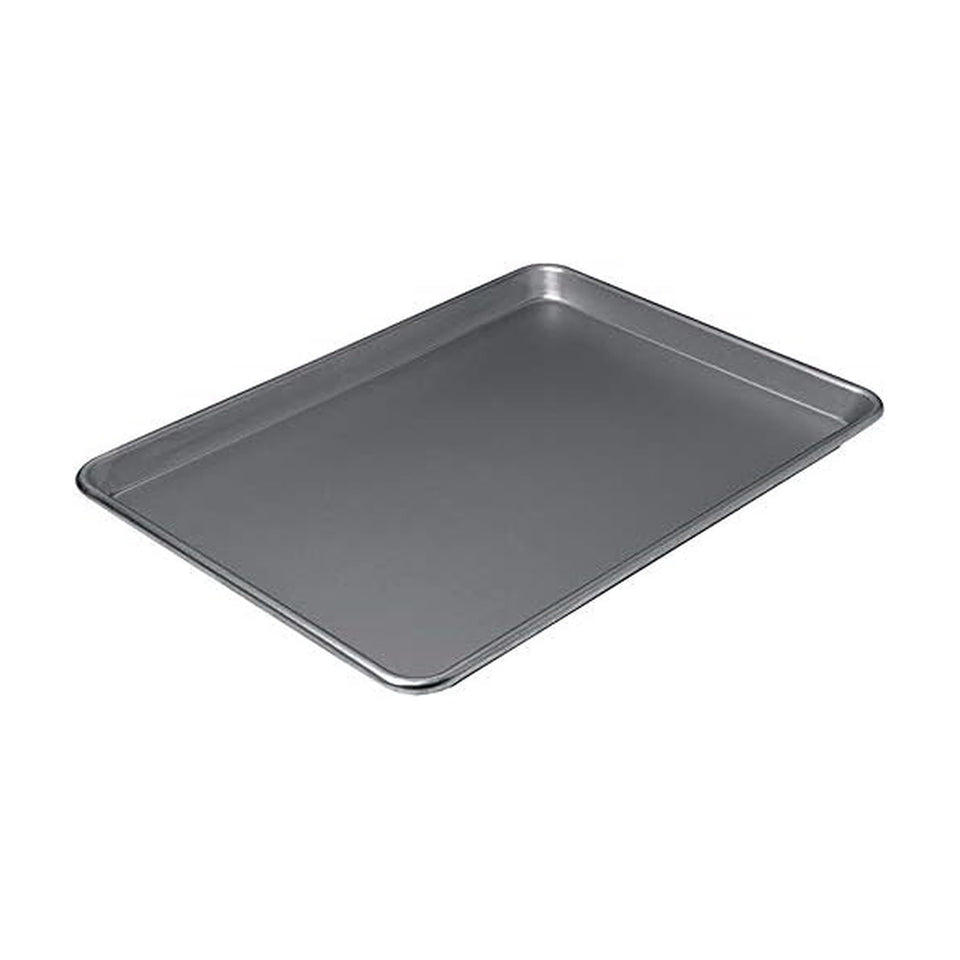 Chicago Metallic Professional non-stick baking sheet in flat lay for even heat distribution.