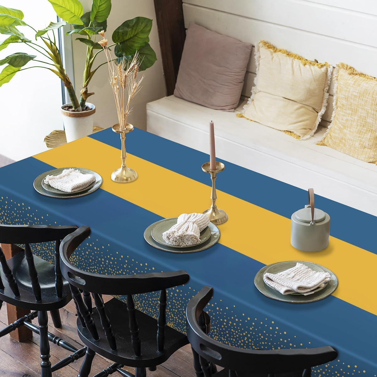 Childom disposable blue-gold tablecloth close-up shows durable PEVA-based material.
