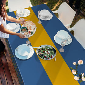 Childom graduation table setting ready for photos and memories with blue and gold motif.