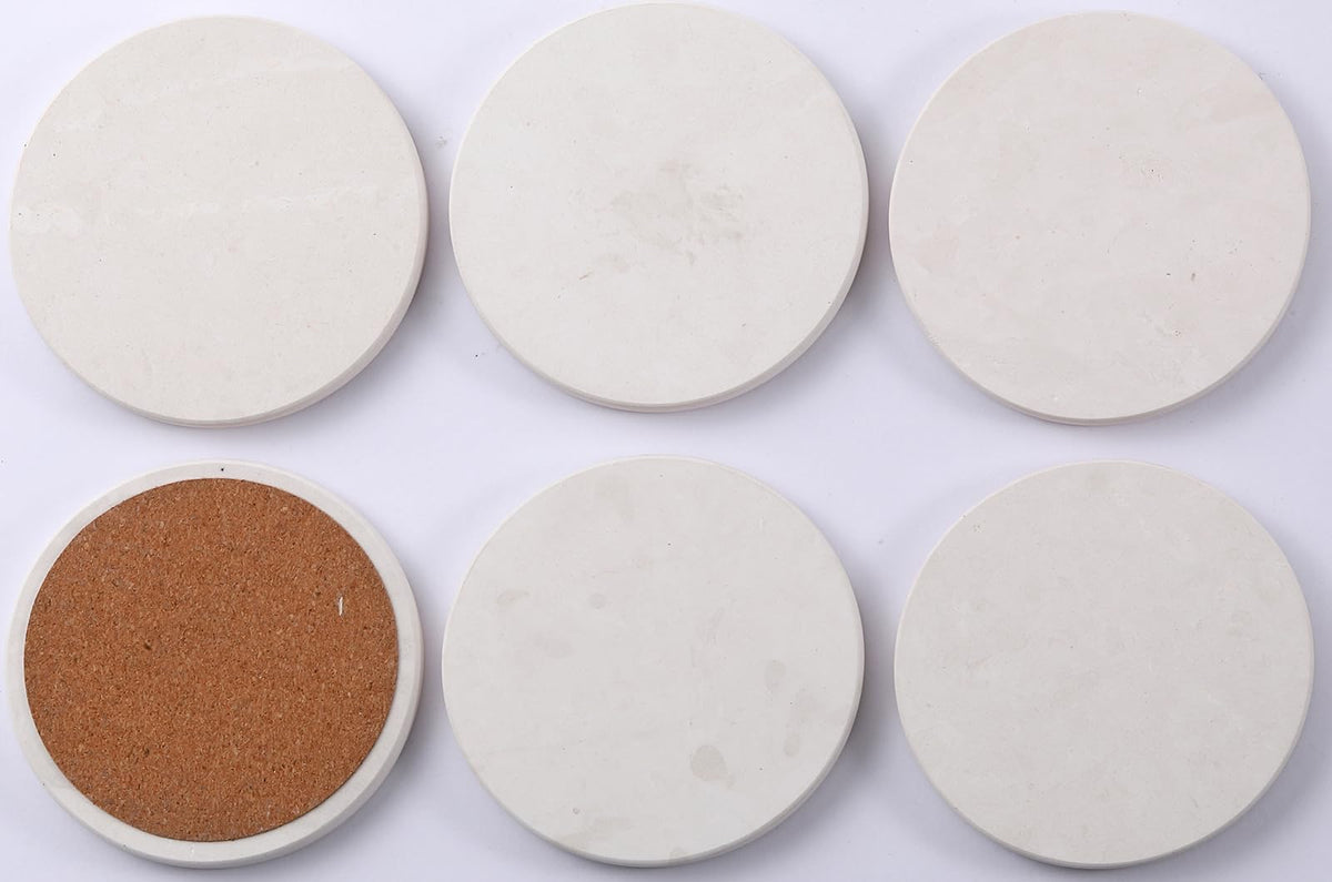 Chiseled ST DF SK limestone coasters for daily use and entertaining.