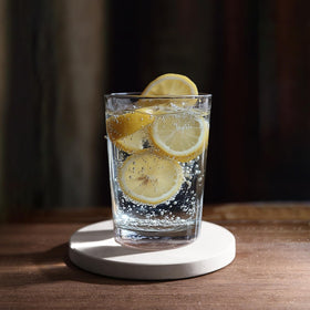 Chiseled ST DF SK coasters provide heat protection for drinks.