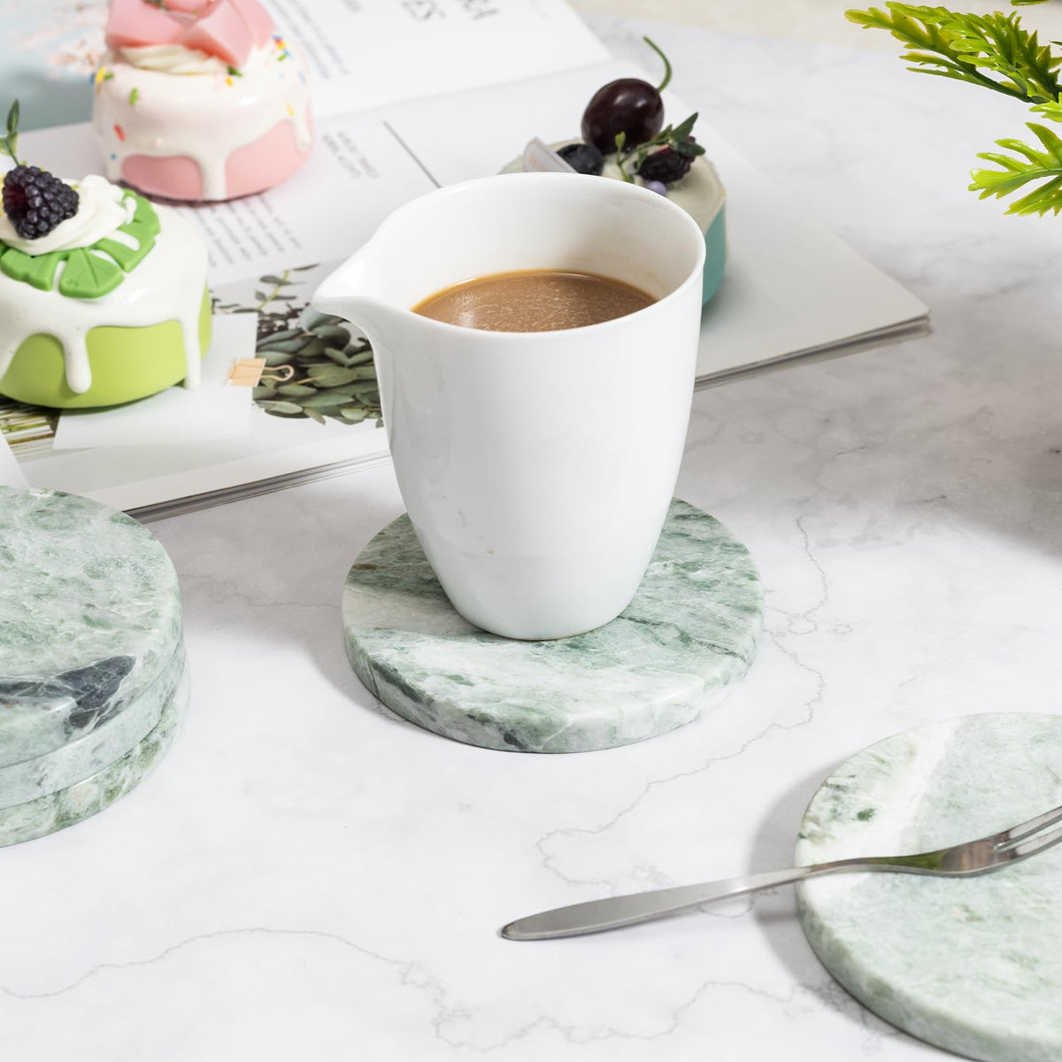CHISELED ST DF SK set of four coasters packaged as a thoughtful housewarming gift.