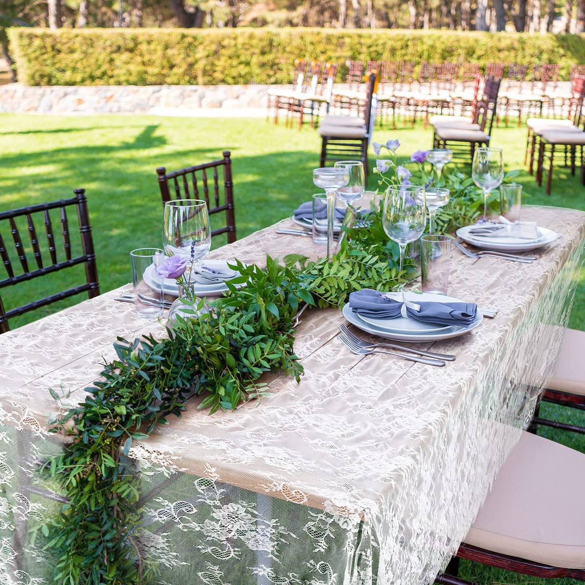 Chumia wedding reception decor lace tablecloth creating a romantic dining ambiance.