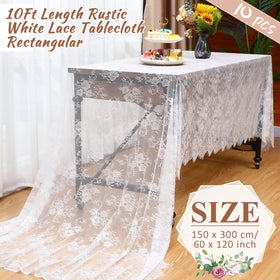 Chumia white lace tablecloth with embroidery detail enhances centerpiece presentation.
