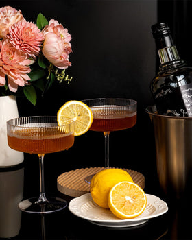 Ciaell stemmed clear coupe design enhances cocktail presentation.