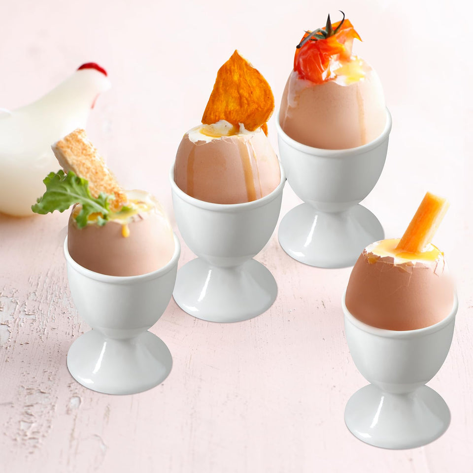 Cinf ceramic egg cup set with porcelain holders arranged for a breakfast display.